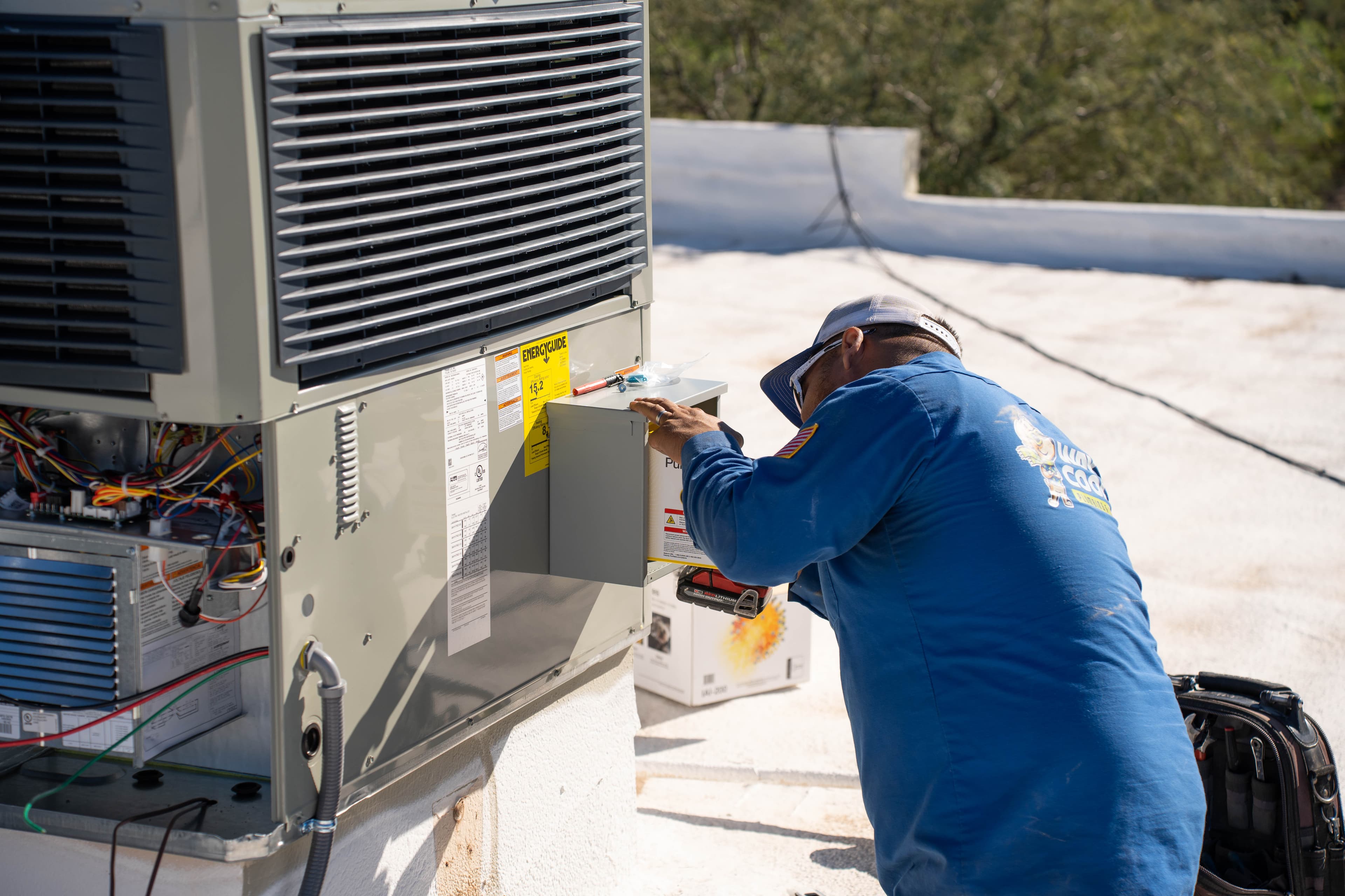 Way Cool tech performing a spring HVAC inspection