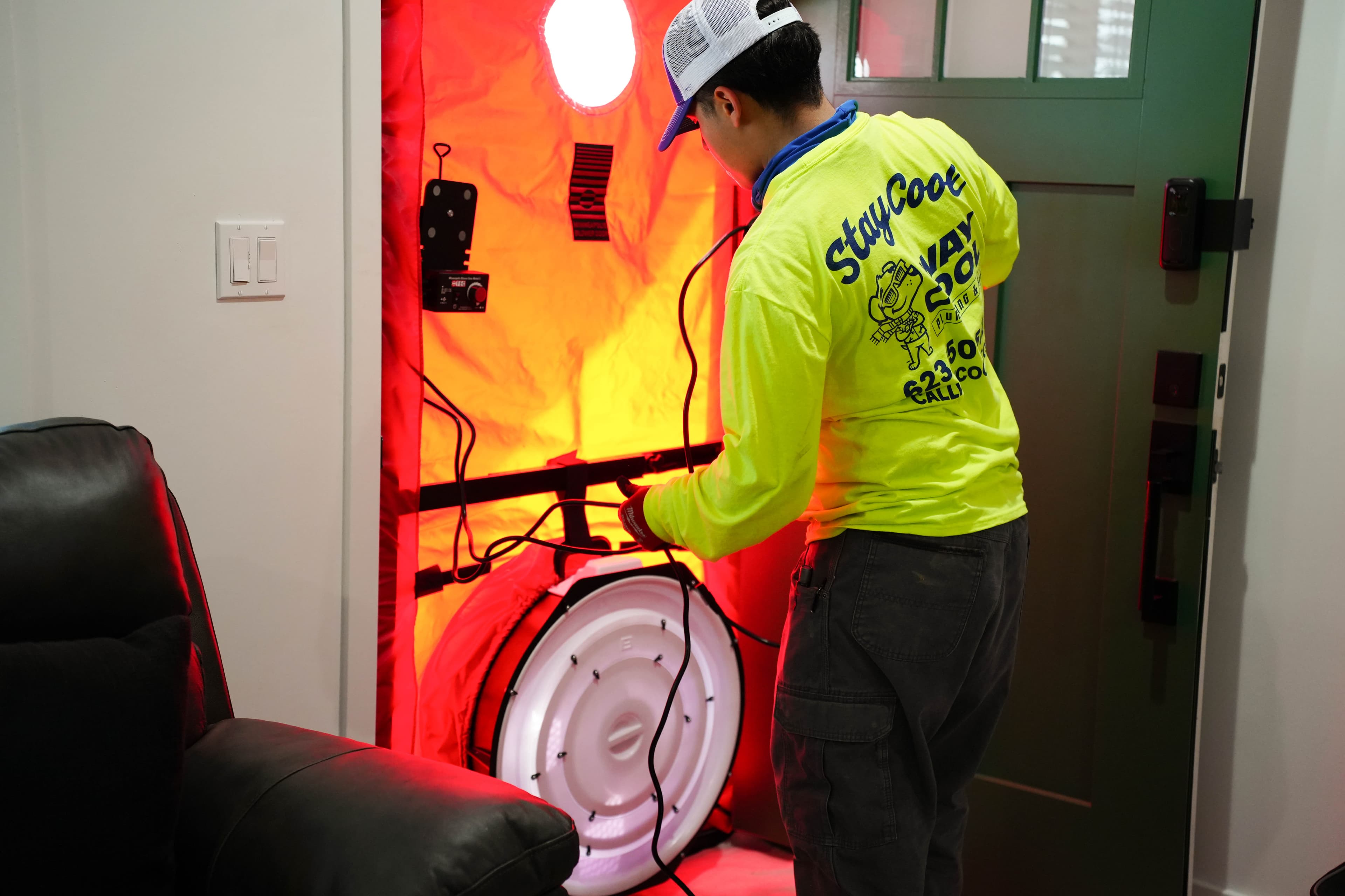 Blower-door test set up at a Phoenix front door