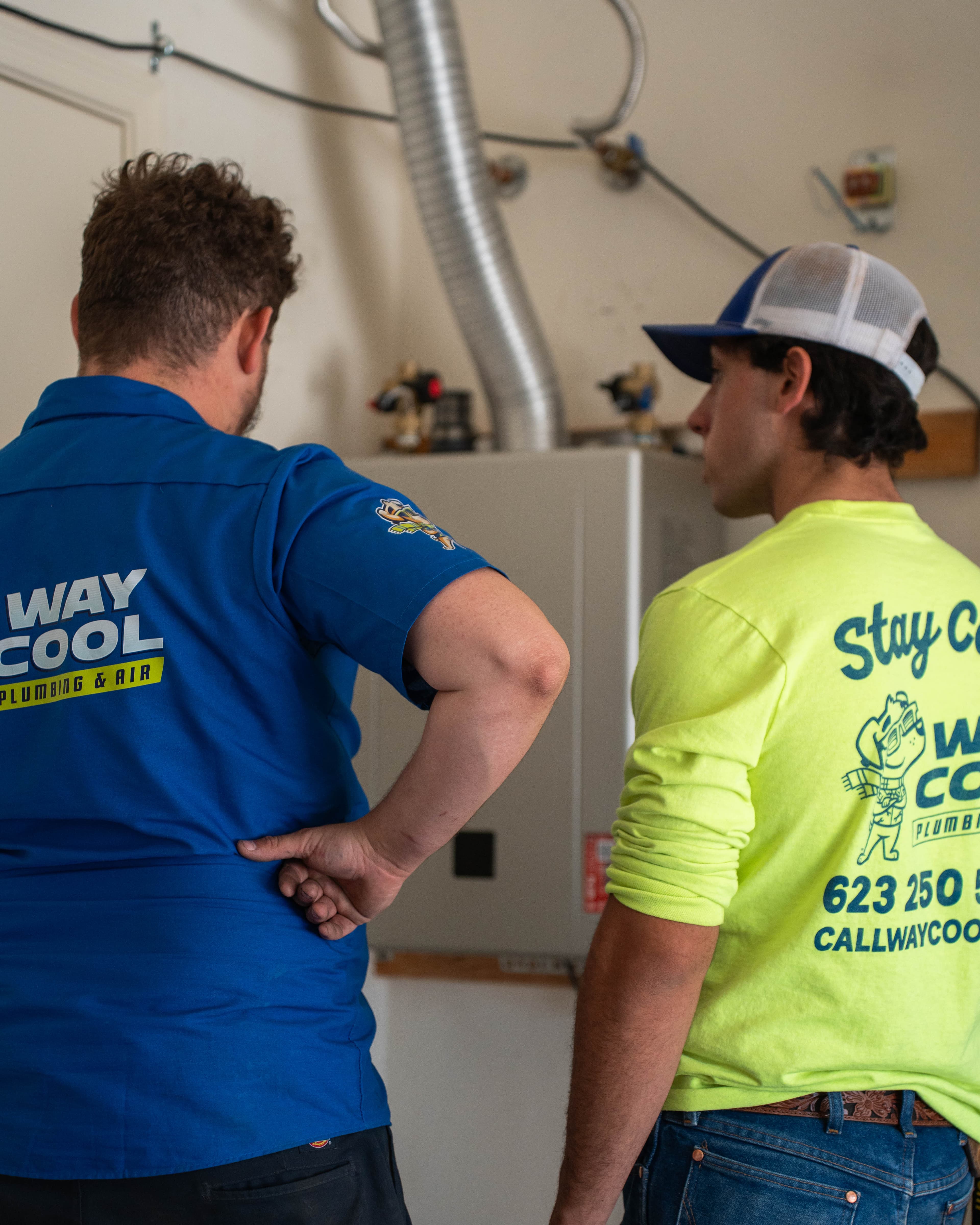 Way Cool plumbers completing a tankless conversion