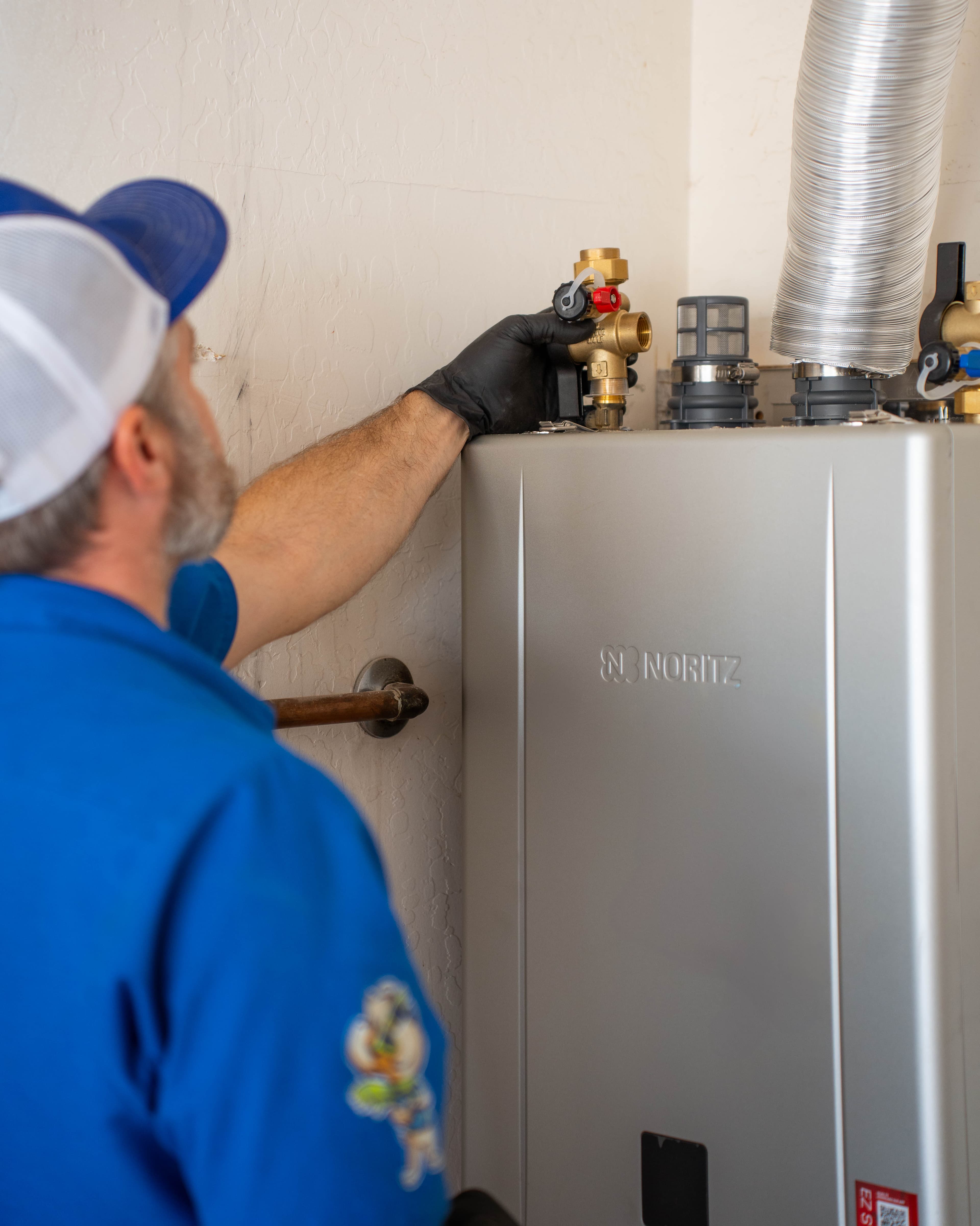Tankless water heater wall-mounted close-up